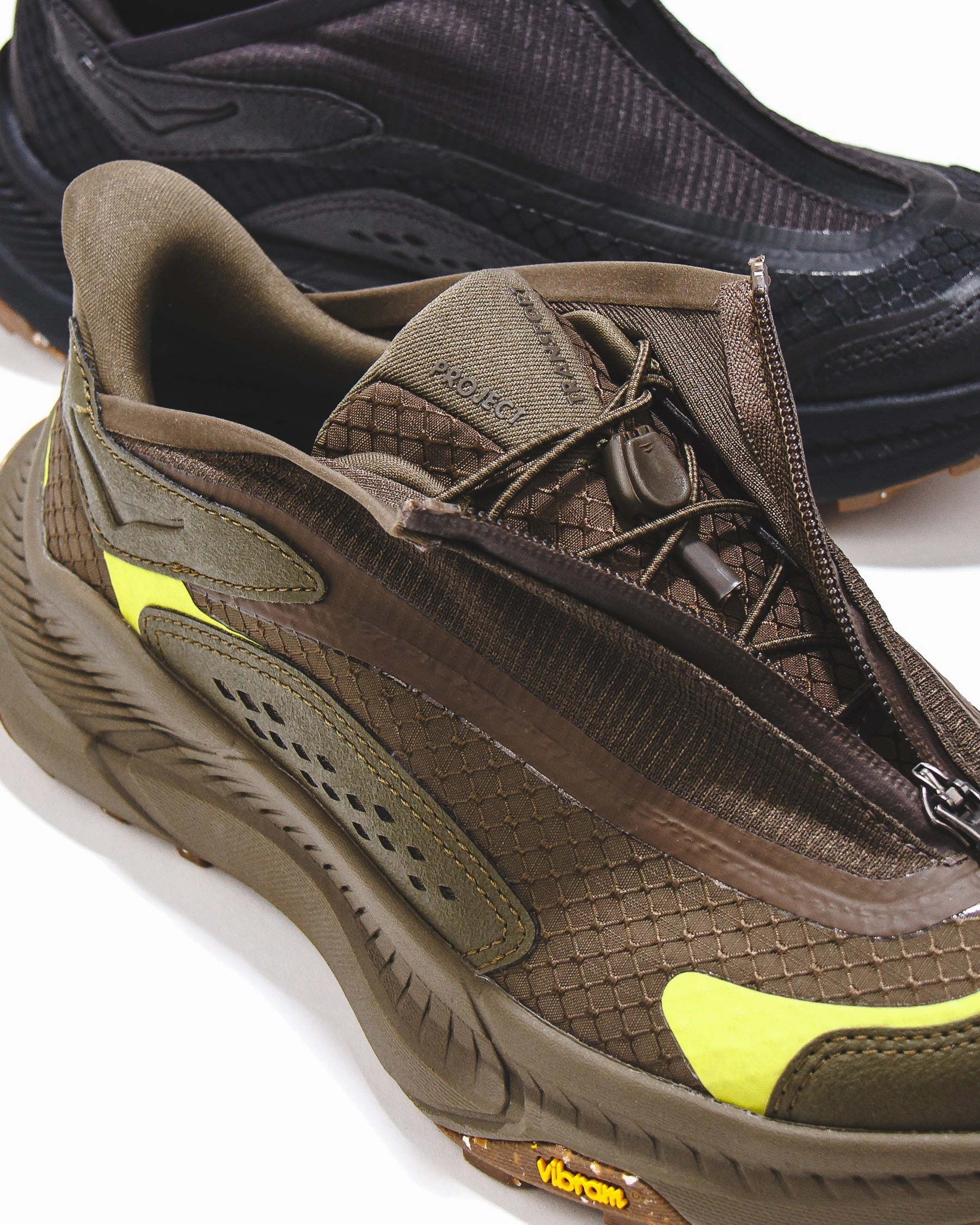 Hoka One One Men Project Transport Carbon Black 1162850-CRBN Rolling Motion Design functional - feature shoes