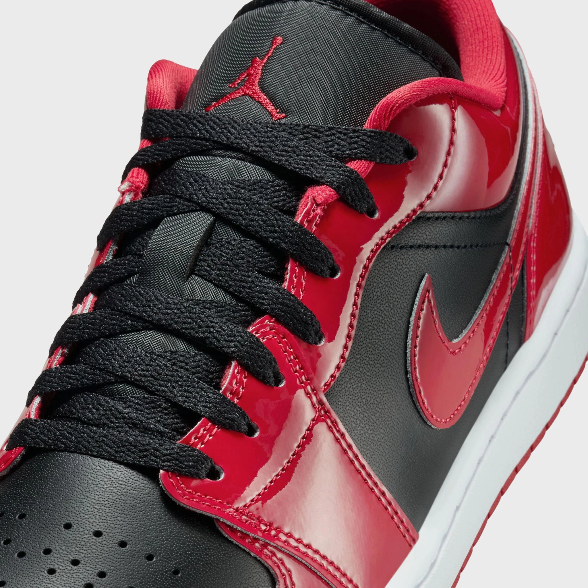 Stability Jump Air Jordan 1 Low Black / White / Red