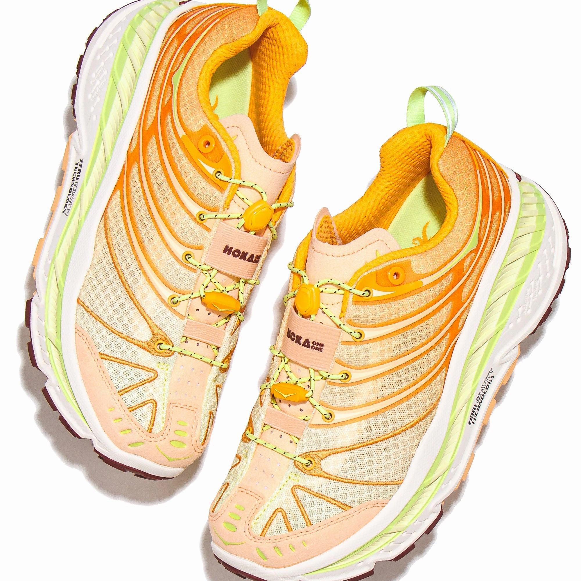 running on a treadmill at the gym shoes Hoka One One Unisex Stinson EVO OG Solar Flare 1155350-SRCN