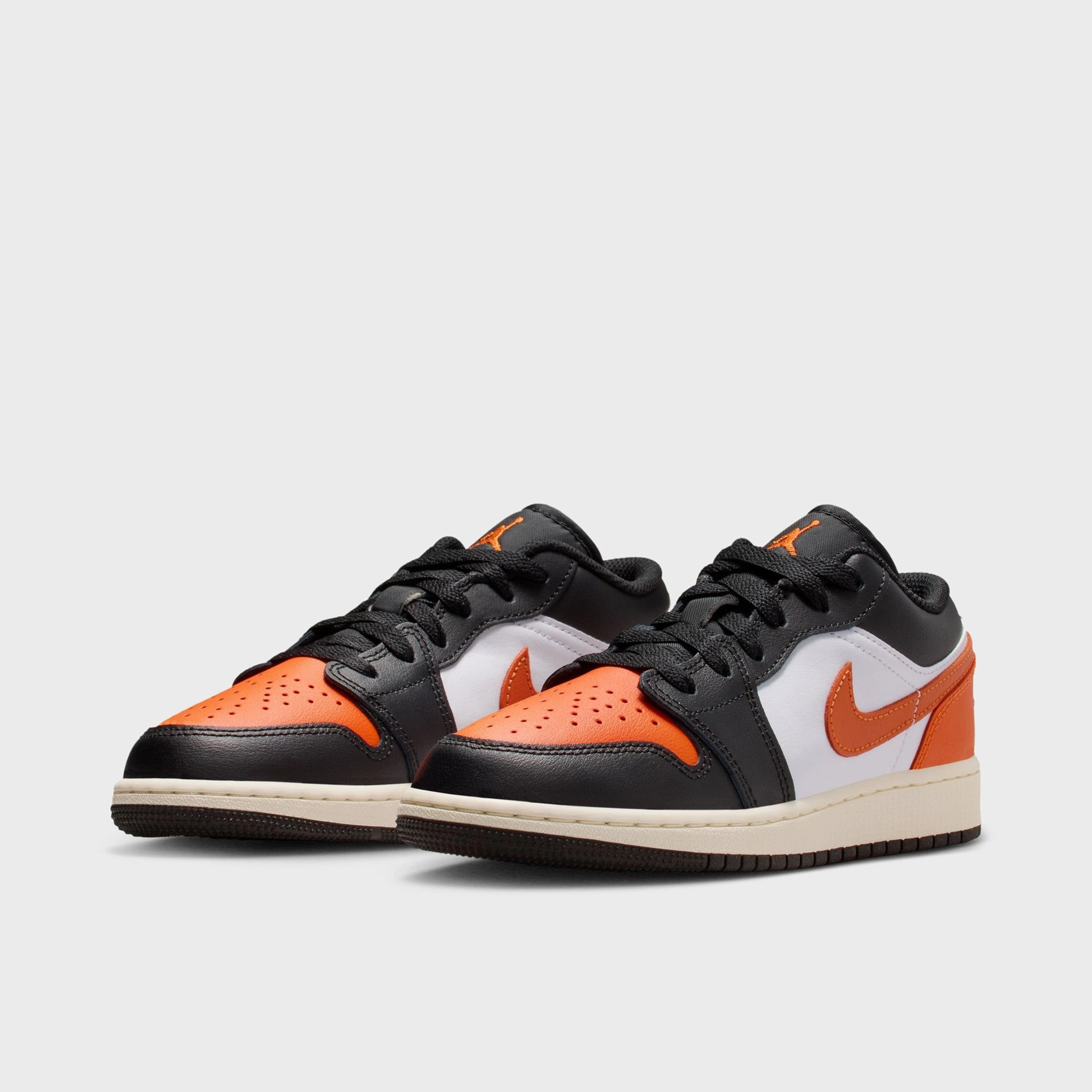 Jordan 1 Low GS Black / Starfish - White Neutral Stability Frame Foot Strike Control