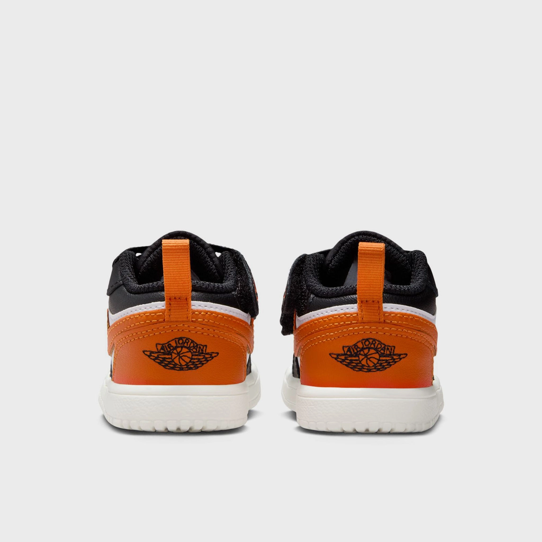 Jordan 1 Low TD Black / Starfish - White Side Impact Cushion