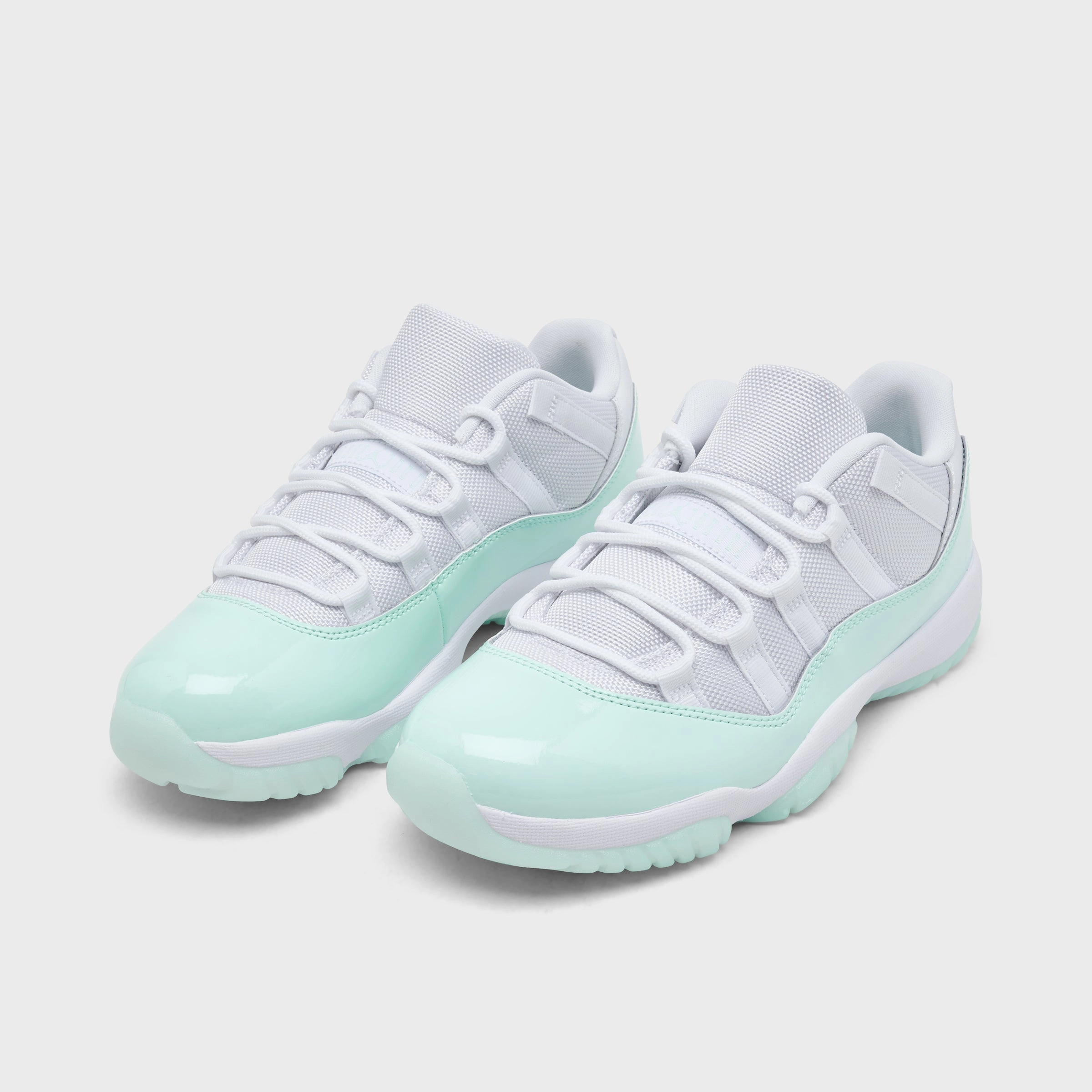 Jordan Women's 11 Retro Low White / Igloo Enhanced Footwork