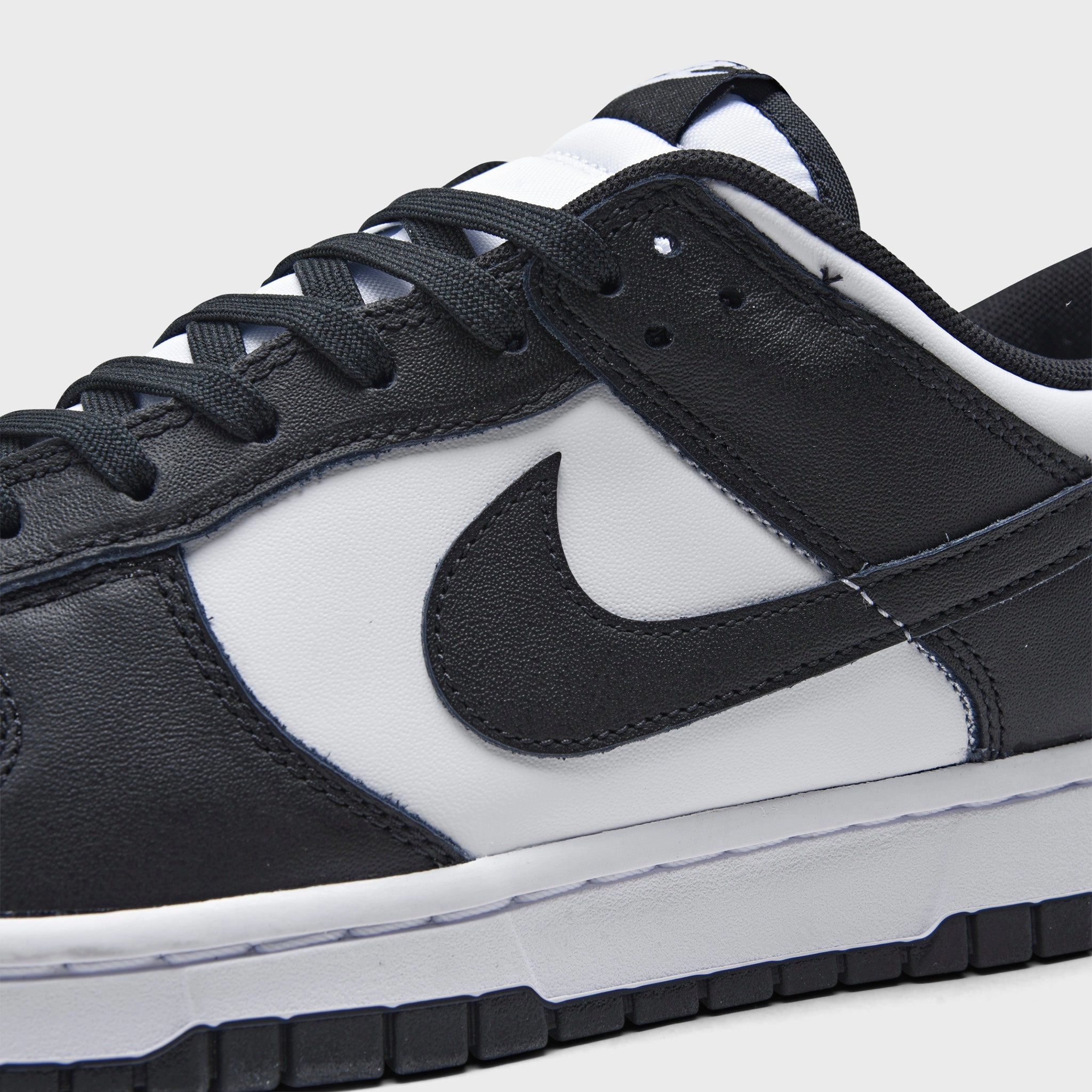 Nike Dunk Low Retro White / Black - White Flex Groove Outsole Silicone Grip Padding