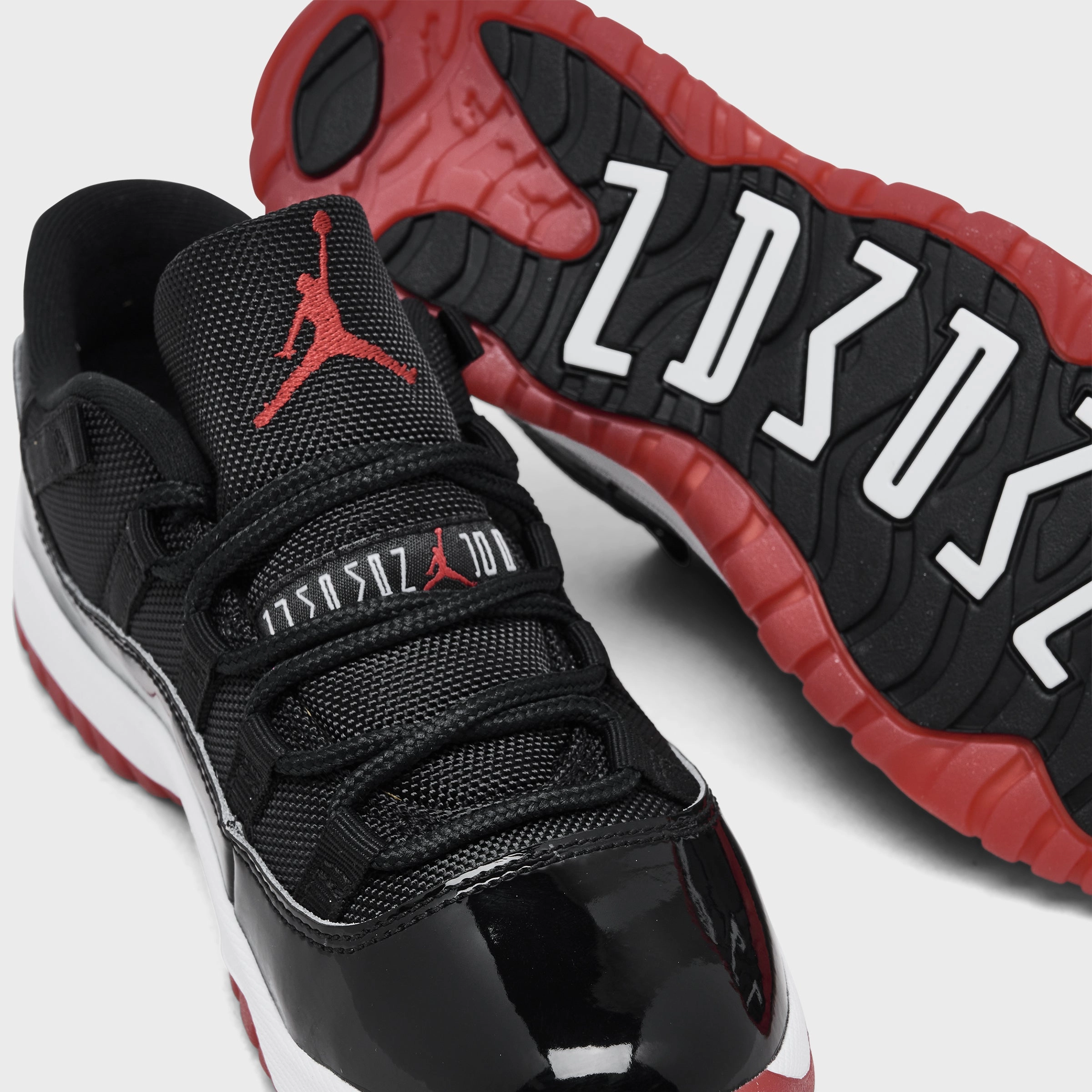 Jordan 11 Retro Low PS Black / Varsity Red - White Hoops Fit Thermal regulation